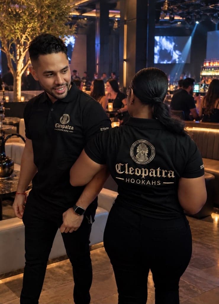 Cleopatra Hookahs dedicated hookah catering staff serving VIP guests at a luxury lounge event in Orlando, FL